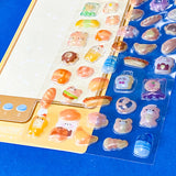 Set of colorful food-themed stickers on a blue background