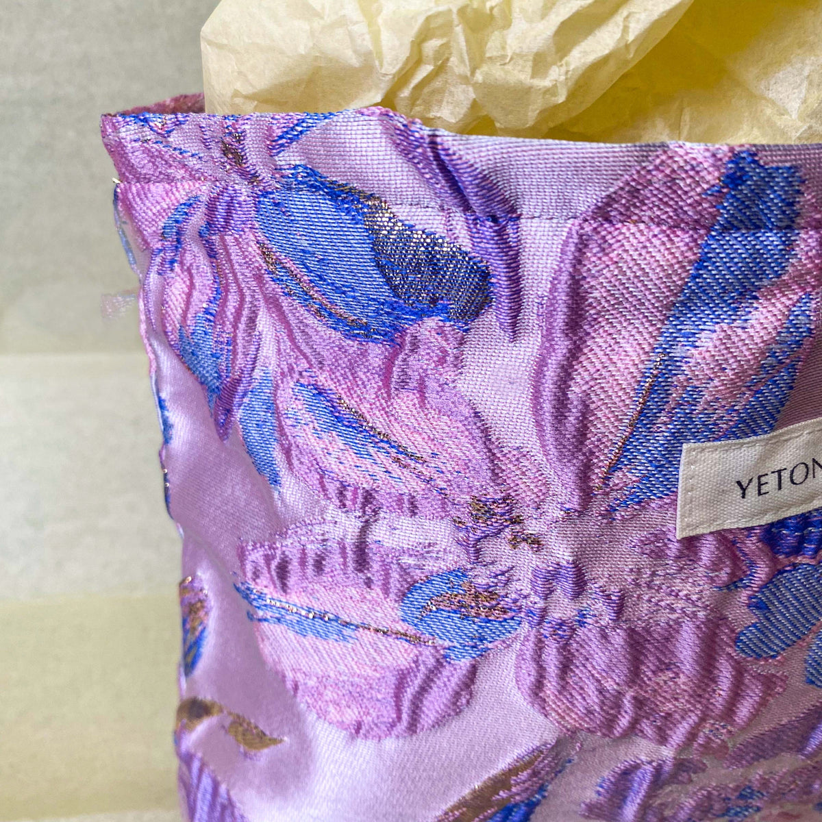 lavender, pink and gold satin tapestry pouch with woven floral design, cream lining, concealed zip and structured gusset base. Pastel large cosmetic bag or jewellery pouch. Journaling storage or travel essentials case. Uk gift shop for letterbox gifts.