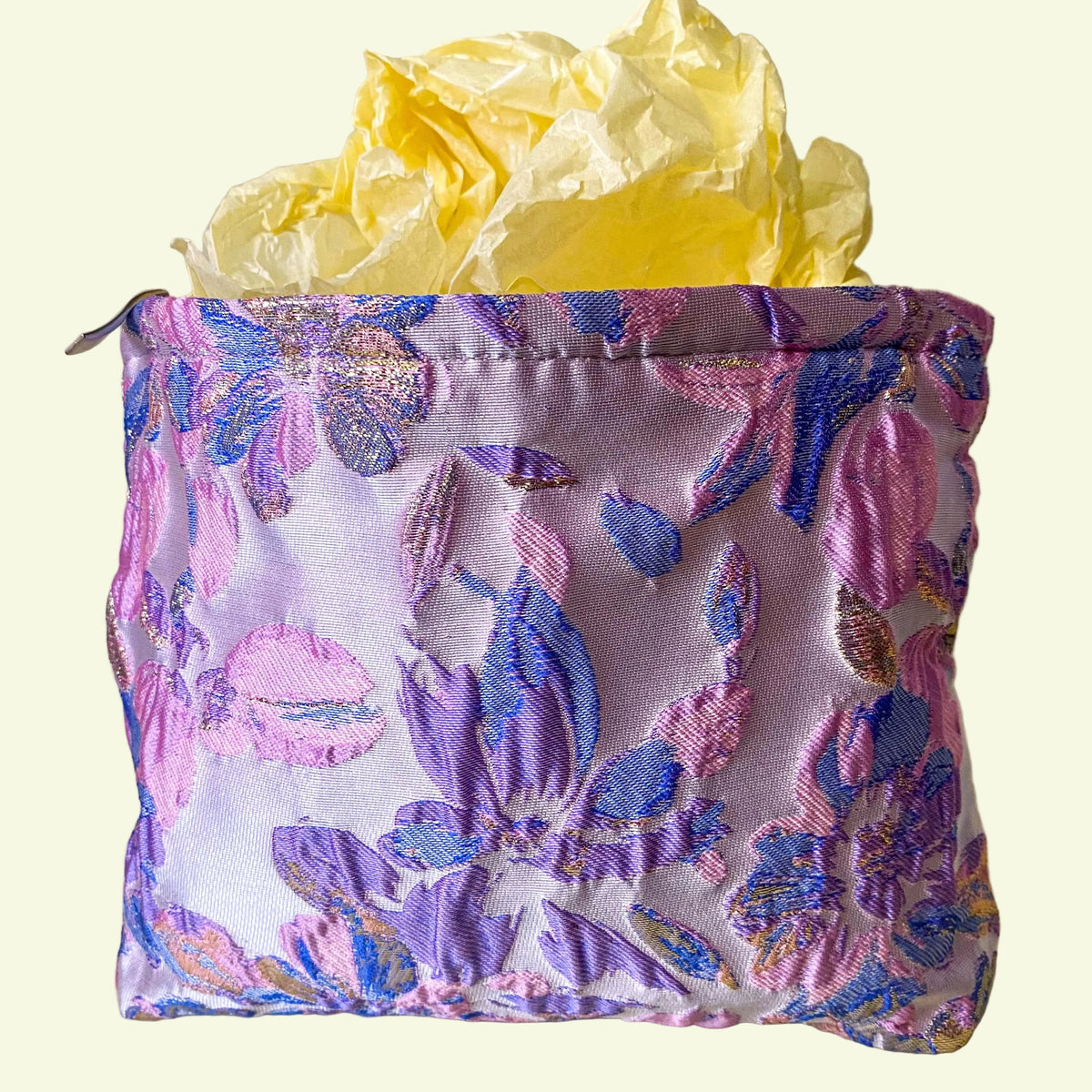 lavender, pink and gold satin tapestry pouch with woven floral design, cream lining, concealed zip and structured gusset base. Pastel large cosmetic bag or jewellery pouch. Journaling storage or travel essentials case. Uk gift shop for letterbox gifts.