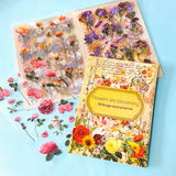 vintage floral clear sticker book with 20 pages of botanical flower stickers including rose, daisy, sunflowers and blossom.