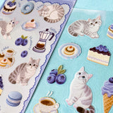2 clear PET sticker sheets in a blueberry treats theme with grey tabby cats and decorative food and drink stickers with a blue theme. Uk cute stationery shop.