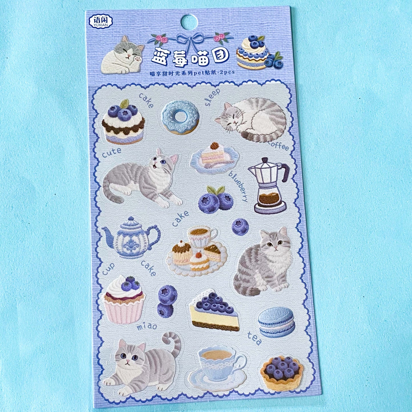 2 clear PET sticker sheets in a blueberry treats theme with grey tabby cats and decorative food and drink stickers with a blue theme. Uk cute stationery shop.