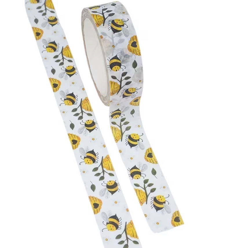 Decorative 10m washi tape with bee and flower pattern on a white background