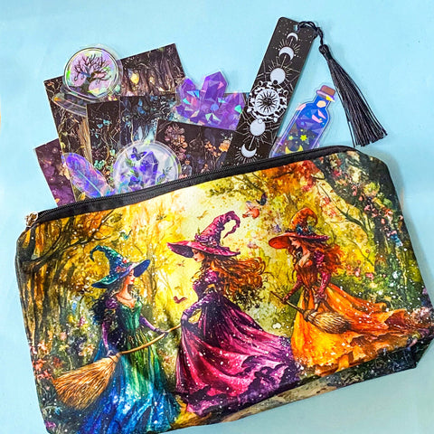 moon witch gift set with illustrated pouch, magical postcards, holographic stickers and celestial bookmark on blue background
