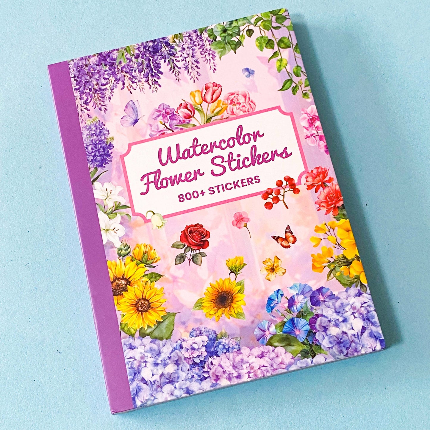 31 page floral sticker book on a blue background