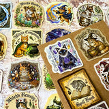 Collection of 50 witch-themed glossy laptop stickers with cats and magical elements on a textured surface. vintage sepia tone with designs including spell caster cat and witch doctor cat