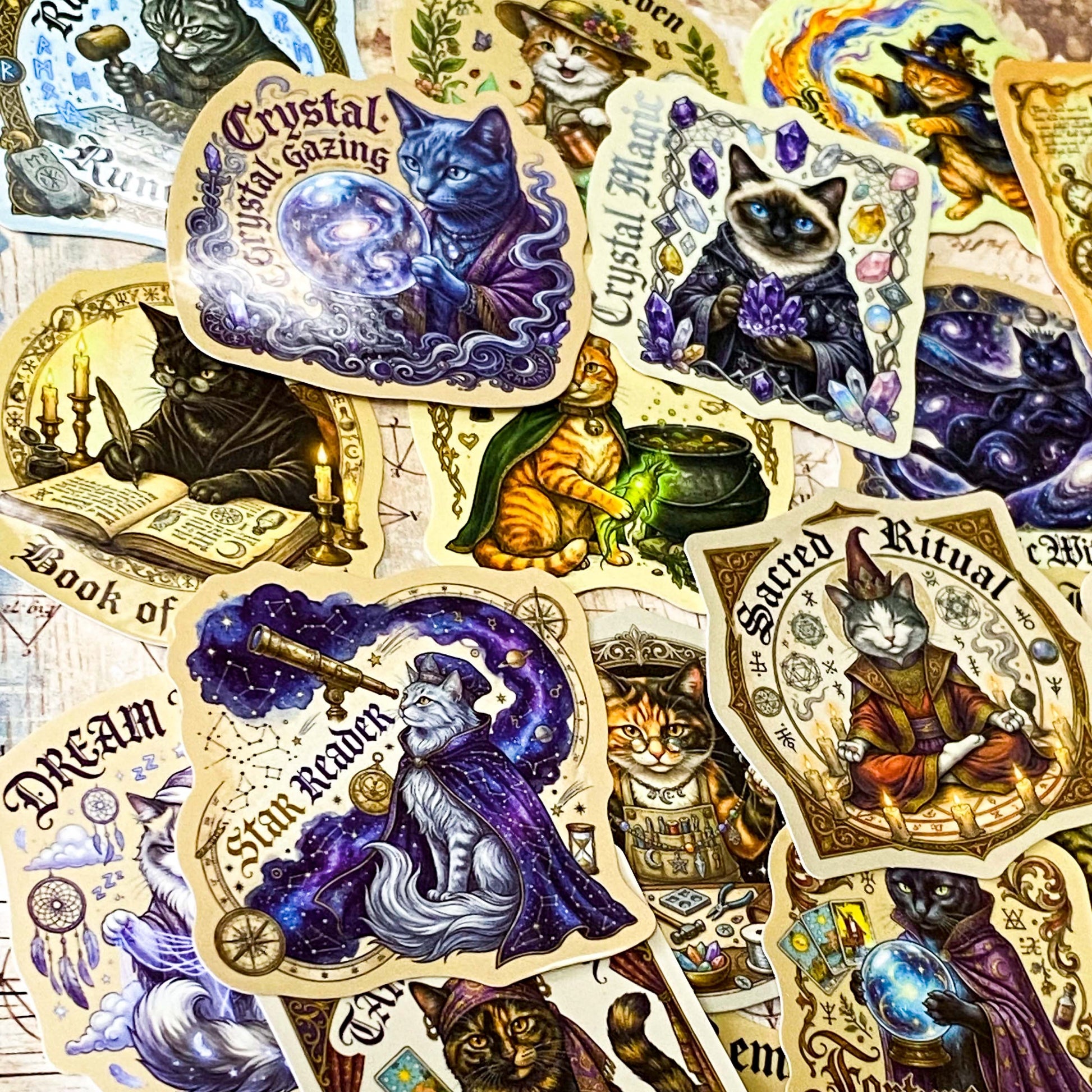 Collection of mystical stickers featuring cats, crystals, and magical elements.