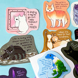 colourful glossy affirmation stickers with cute animals and positive mental health messages including cats, raccoons, lizard, fox and black cat on pastel background