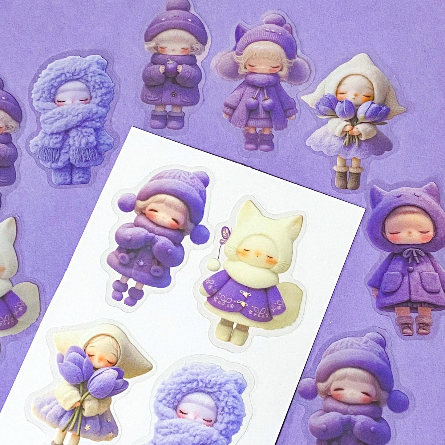 kawaii large PET lilac and purple doll stickers set of 20 with big colourful figures wearing winter clothing and holding spring flowers. Tulips, wooly hats and cat costumes. Cute stationery shop uk.