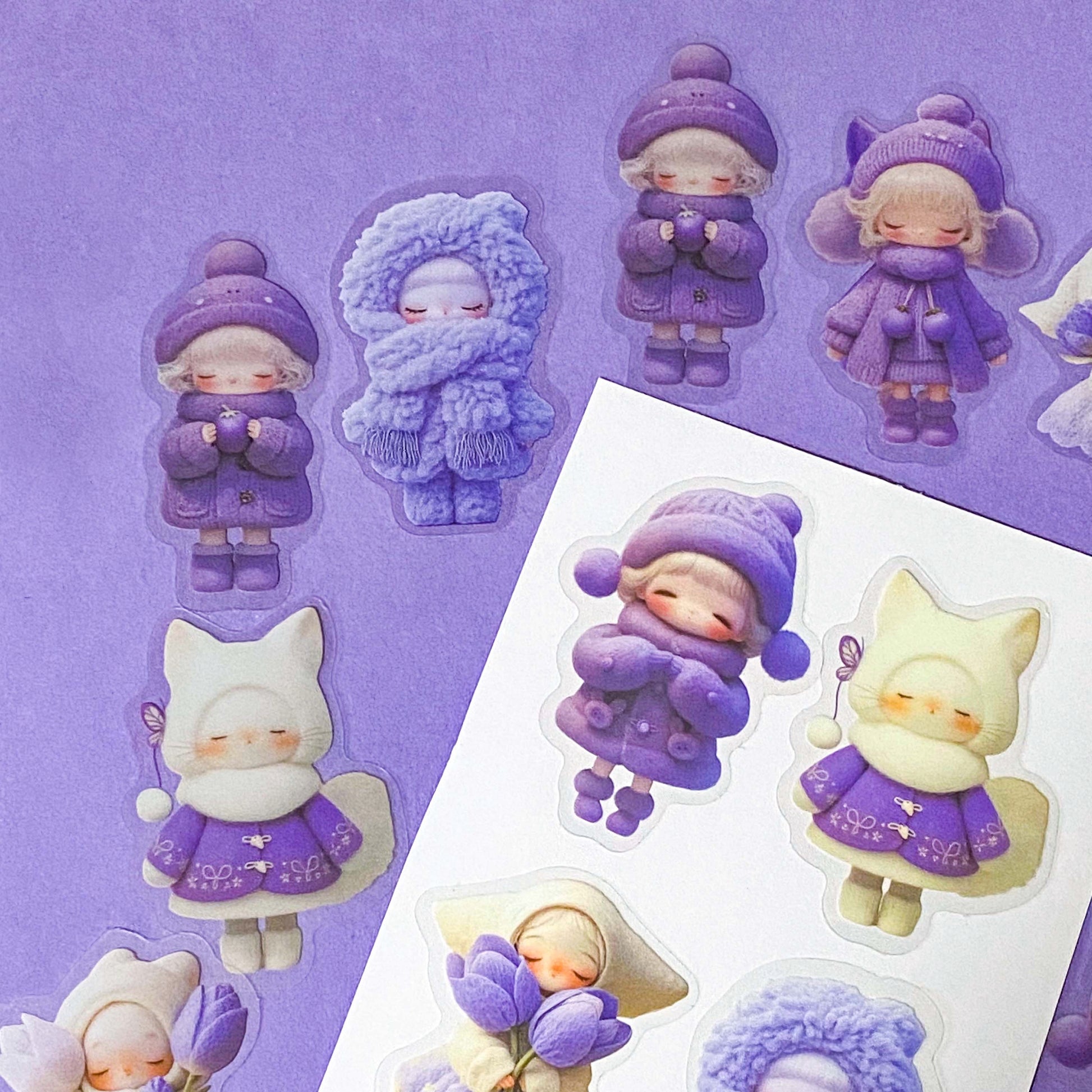 kawaii large PET lilac and purple doll stickers set of 20 with big colourful figures wearing winter clothing and holding spring flowers. Tulips, wooly hats and cat costumes. Cute stationery shop uk.