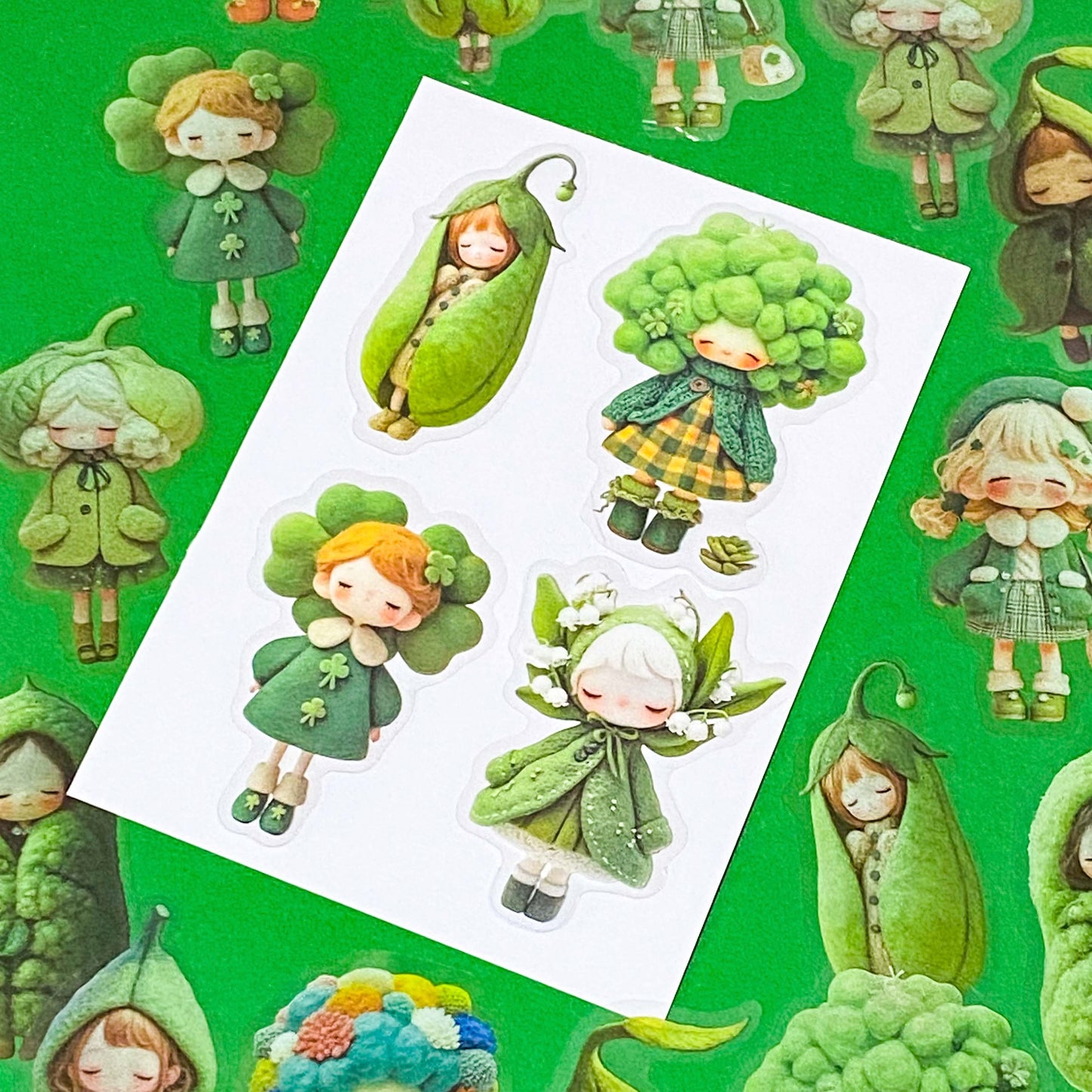 edible vegetables cute green large PET doll stickers with adorable costumes of peas, broccoli, lily of the valley, clover and winter cosy clothing outfits. Vibrant sticker pack of 20. Uk small stationery business.