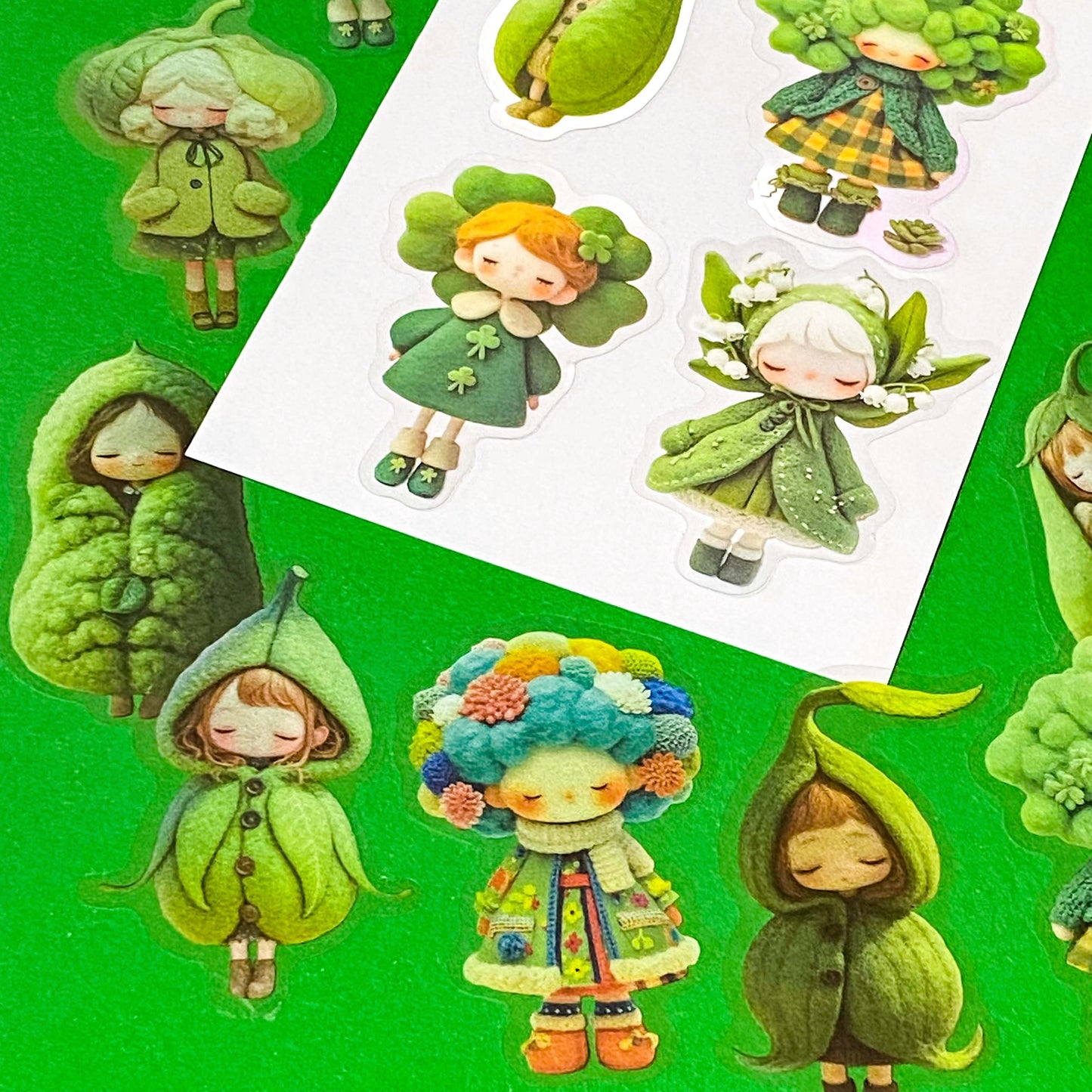 edible vegetables cute green large PET doll stickers with adorable costumes of peas, broccoli, lily of the valley, clover and winter cosy clothing outfits. Vibrant sticker pack of 20. Uk small stationery business.