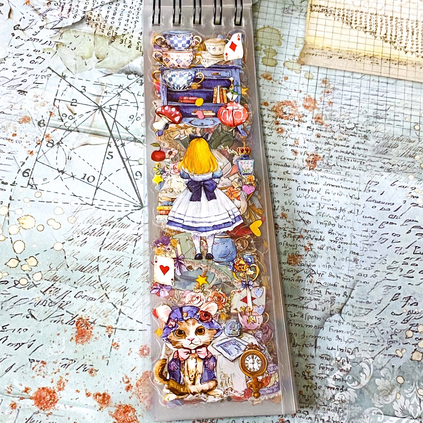 alice in wonderland long sticker book of 50 designs including alice and cat with teacups and playing cards