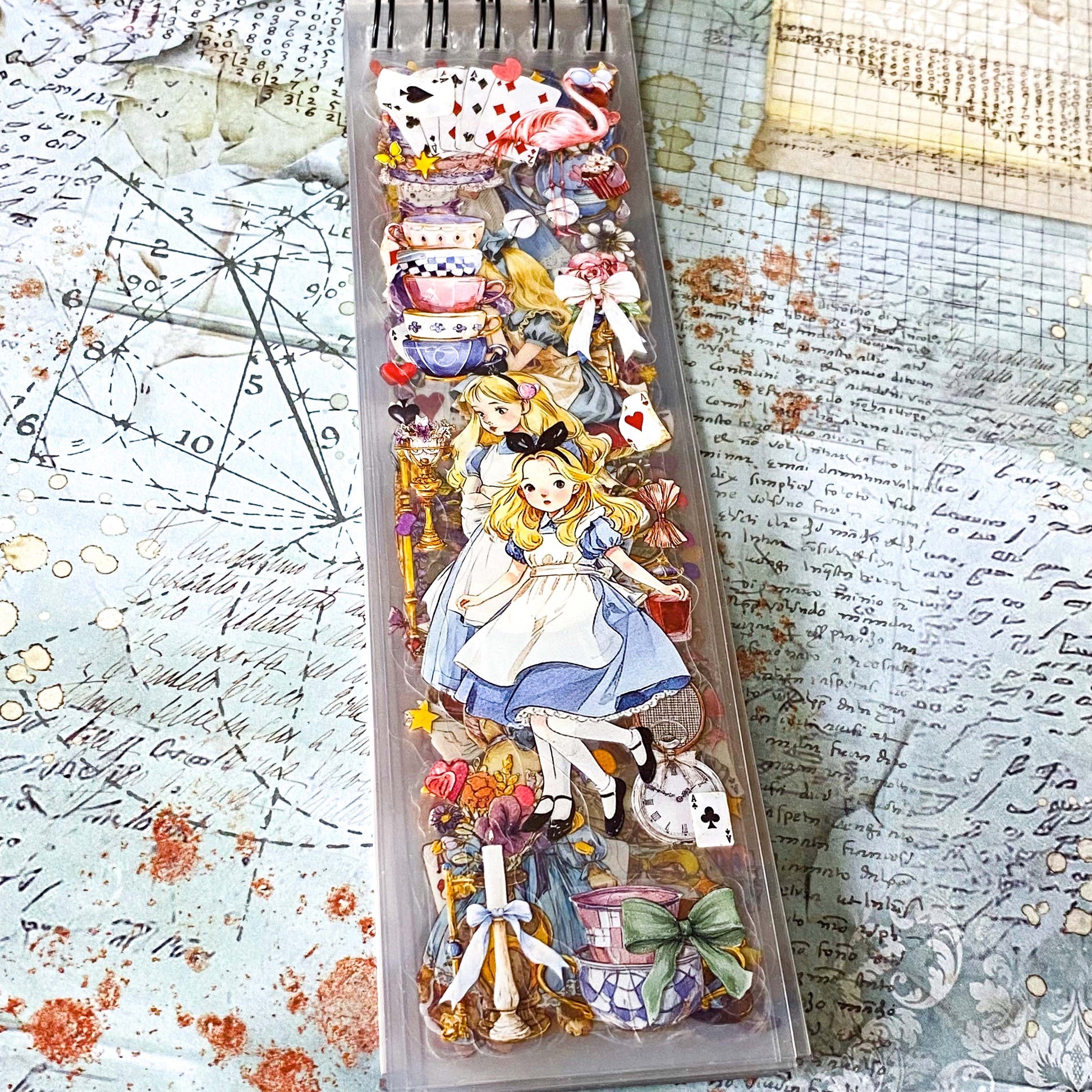 vintage alice long sticker pages in a spiral bound book for scrapbooking and journaling