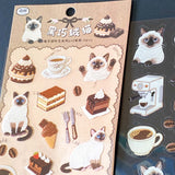 sticker sheets with clear PET cats and cafe food and drinks including siamese cat, coffee, cake, ice cream and pastries in a café aesthetic for planner and journal supplies