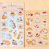 two assorted clear PET sticker sheets featuring ginger cats with bakery treats, pastries, cakes and cosy dessert illustrations. uk planner supplies shop