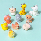 flocked furry fuzzy animal animals charm charms resin soft fluffy cute kawaii pendant pendants uk squirrel squirrels cat cats grey brown orange yellow duck ducks pig pigs seal seals giraffe giraffes ram sheep lamb guinea pig hamster gerbil fox foxes white silver tone metal hook