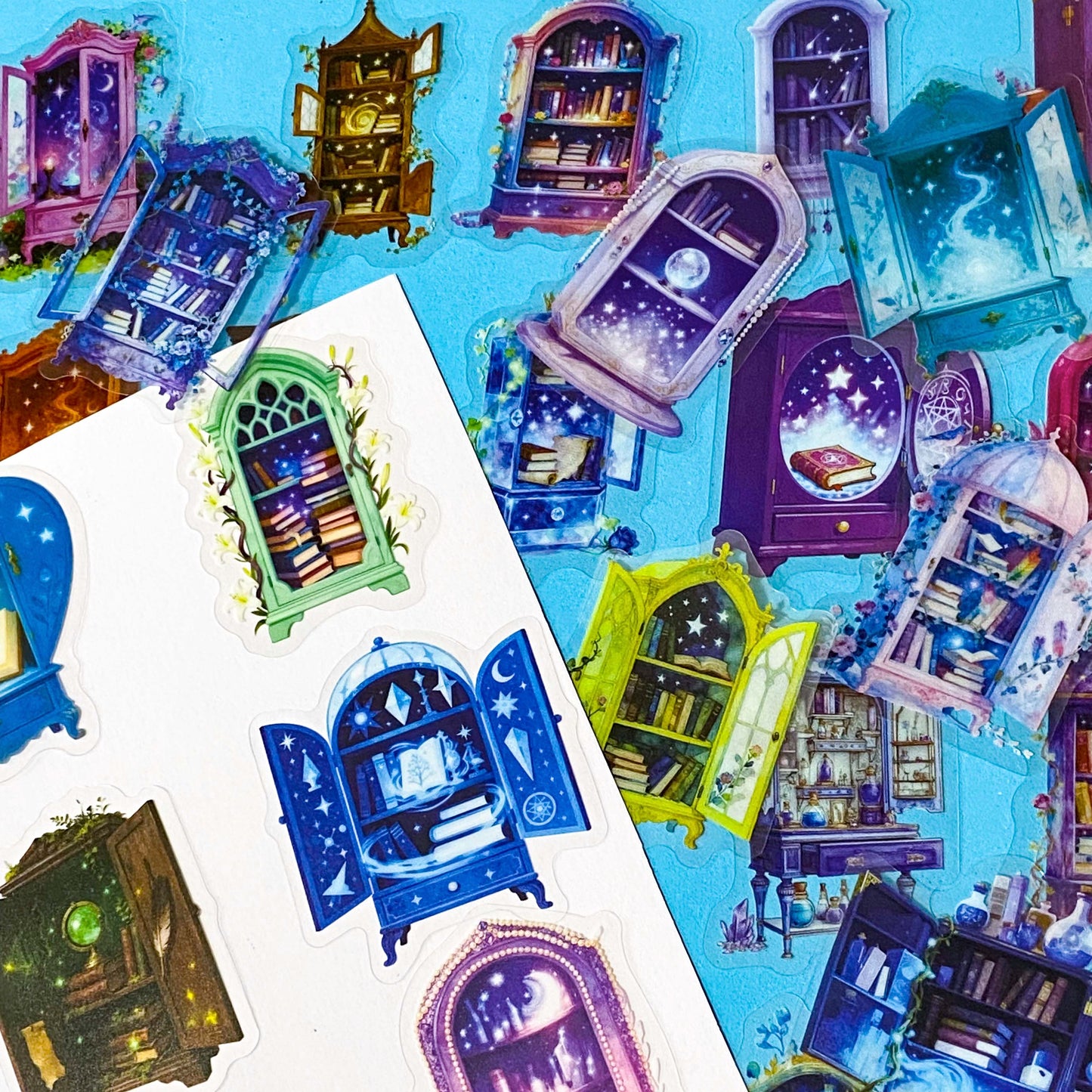 fantasy plastic sticker set featuring magical cabinets, glowing bookshelves, potion cupboards and celestial library illustrations in blue, purple and green tones. UK cute stationery, sticker shop.