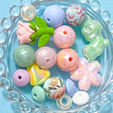 large acrylic and silicone beads in shades of mint green pastel pink and blue