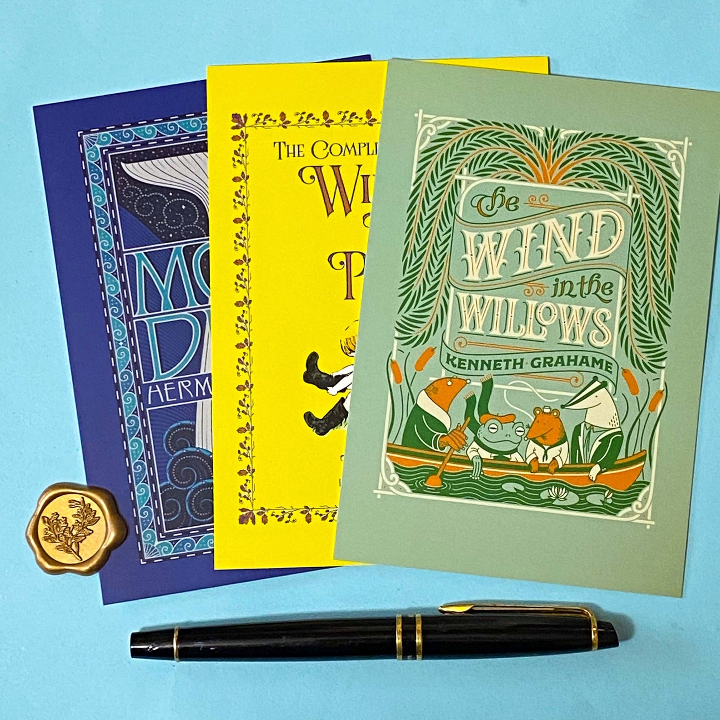 set of 3 vintage storybook cover postcards including winnie the pooh, moby dick and wind in the willows