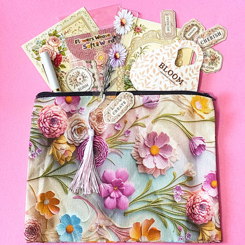 vintage floral letterbox gift set with large flower pouch, pearly white metal pen, daisy tassel acrylic bookmark, floral postcards and vintage decorative journaling stickers on pink background. UK cute gifts and stationery sets.