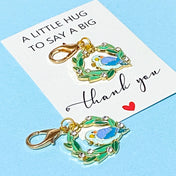 blue bird and wreath enamel and gold metal keyring clip gift with the words thank you to say a big hug
