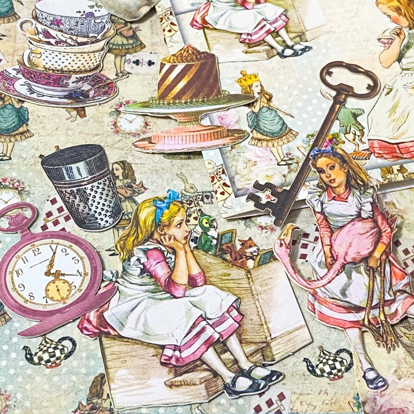 vintage alice in wonderland paper ephemera with floral backgrounds and character illustrations for journalling