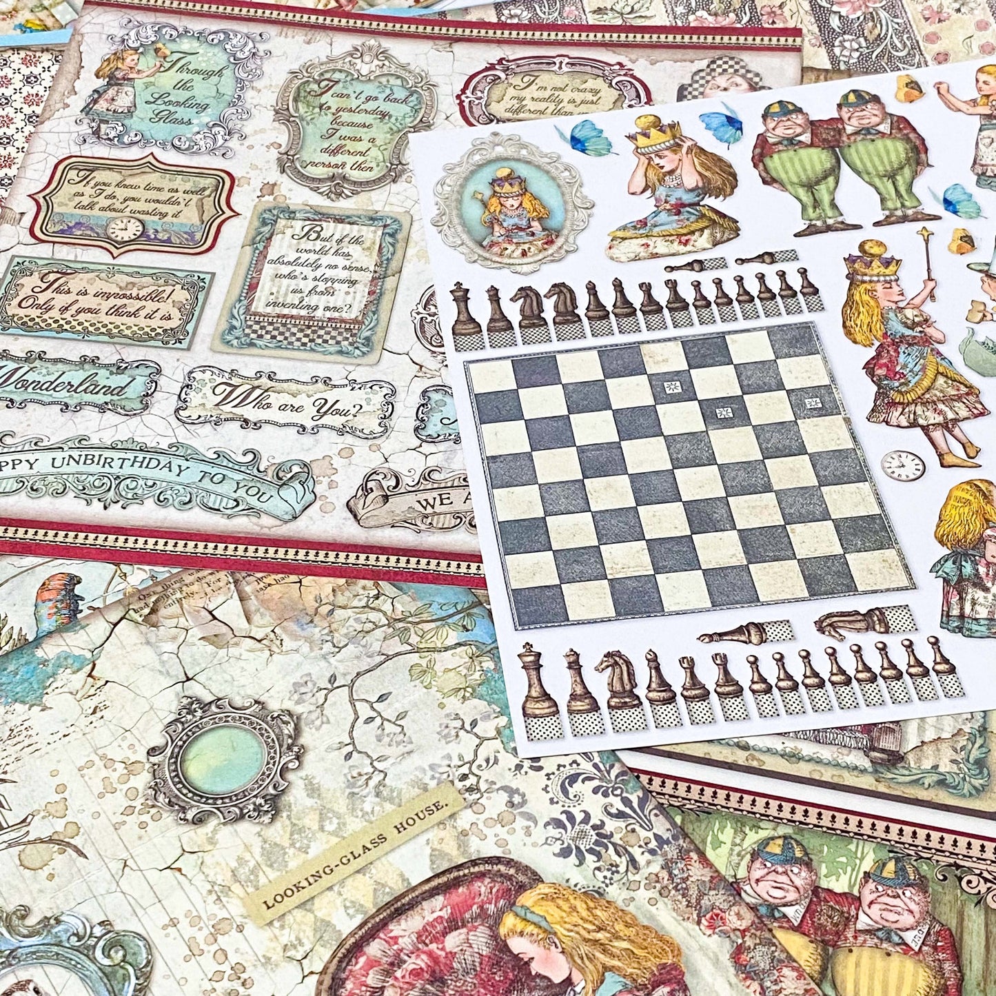 alice in wonderland thick scrapbooking paper 190gsm with vintage illustrations, tags, borders, teapots, chess boards and patterns