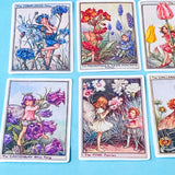 set of 16 large vintage style flower fairy satin stickers featuring botanical illustrations of fairies with flowers including lavender, tulip and poppy, with rounded corners