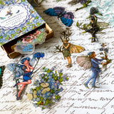 flower fairy clear sticker box with vintage botanical fairies transparent stickers set in blue box, blue violet and turquoise green flowers and butterflies
