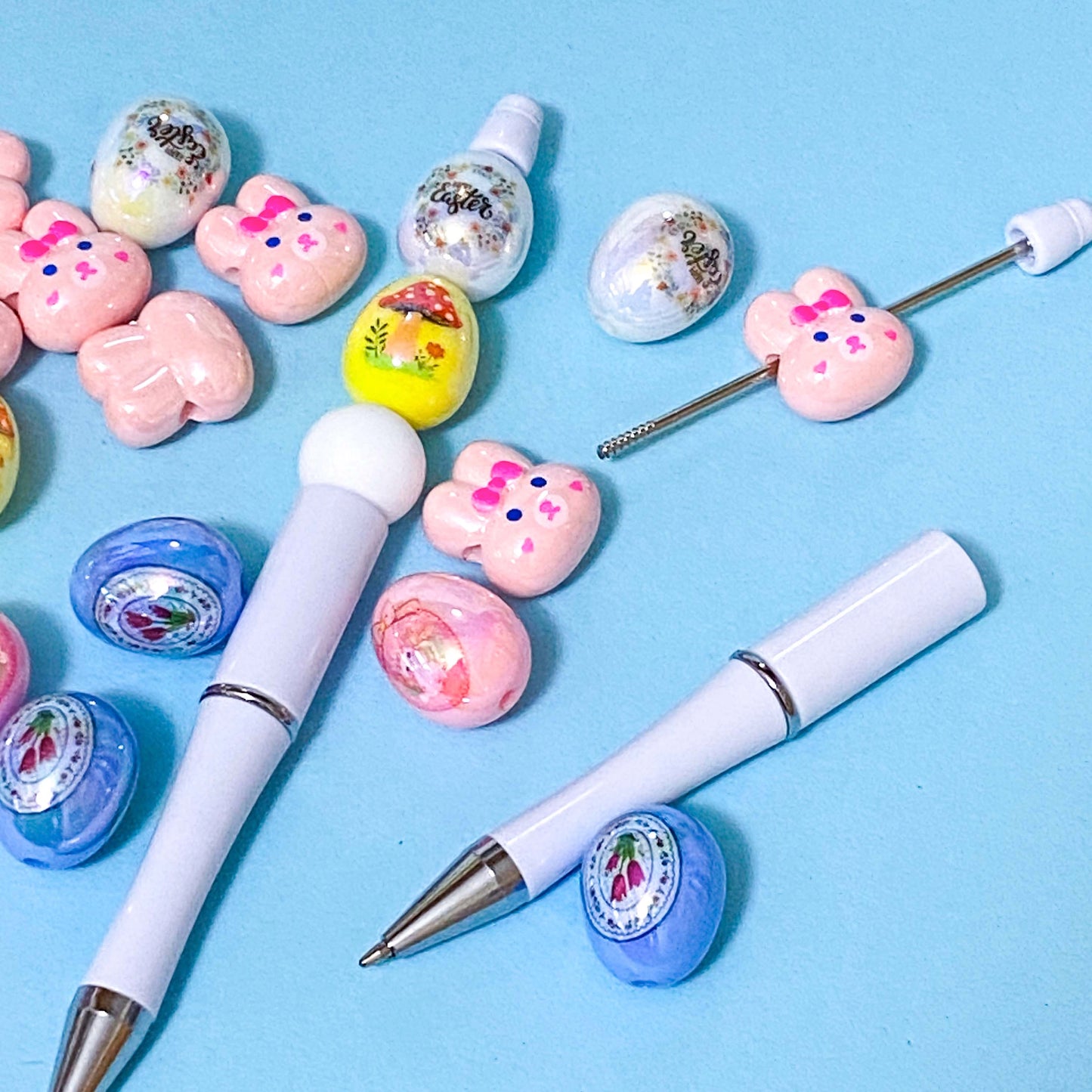 glossy lustre egg eggs easter spring bead beads jumbo large big chunky acrylic craft supplies for making beaded pen pens jewellery pink rabbit rabbits bunny bunnies 20mm 21mm uk cute kawaii stationery shop store pretty yellow white blue iridescent pearl pearly
