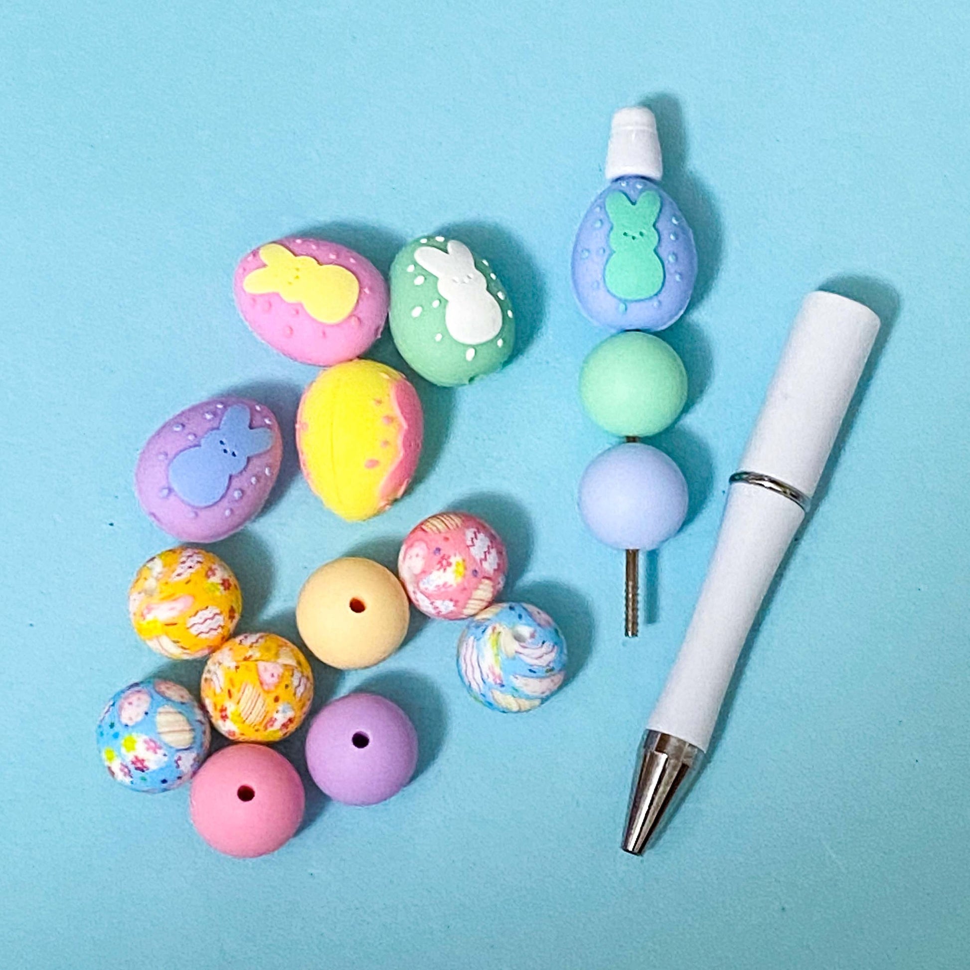 make a beaded pen with silicone egg and round beads on a white pen base