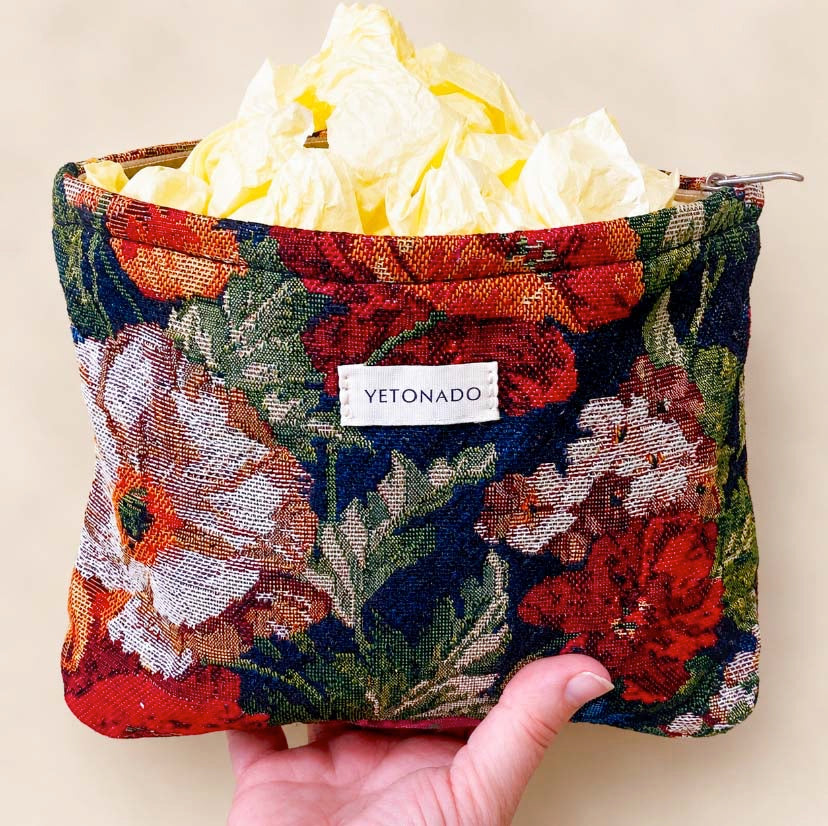 dark floral tapestry woven pouch with concealed zip fastening, lining and gusset. Large cosmetic bag with botanical design and textured fabric. manor garden. 