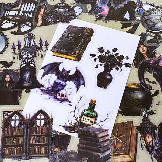 pack of 50 gothic PET stickers featuring ravens, dragons, black cats, antique books, potion bottles, crystals, witches, bats and dark academia stickers. black aesthetic. uk stationery shop.