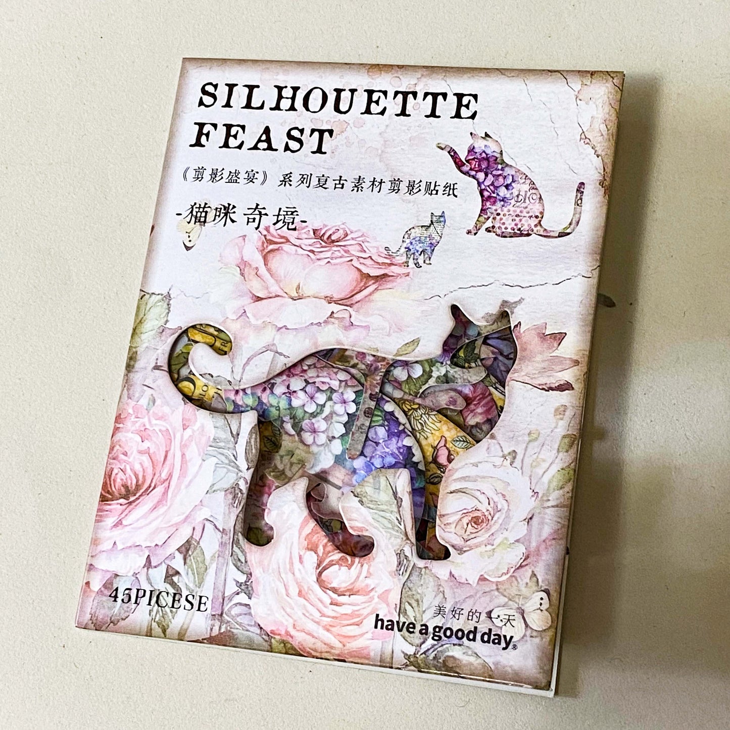 pack of 45 paper stickers featuring elegant cat silhouettes filled with vintage roes, hydrangeas, botanical flowers and antique inspired illustrations. uk stationery shop for journaling and scrapbooking.