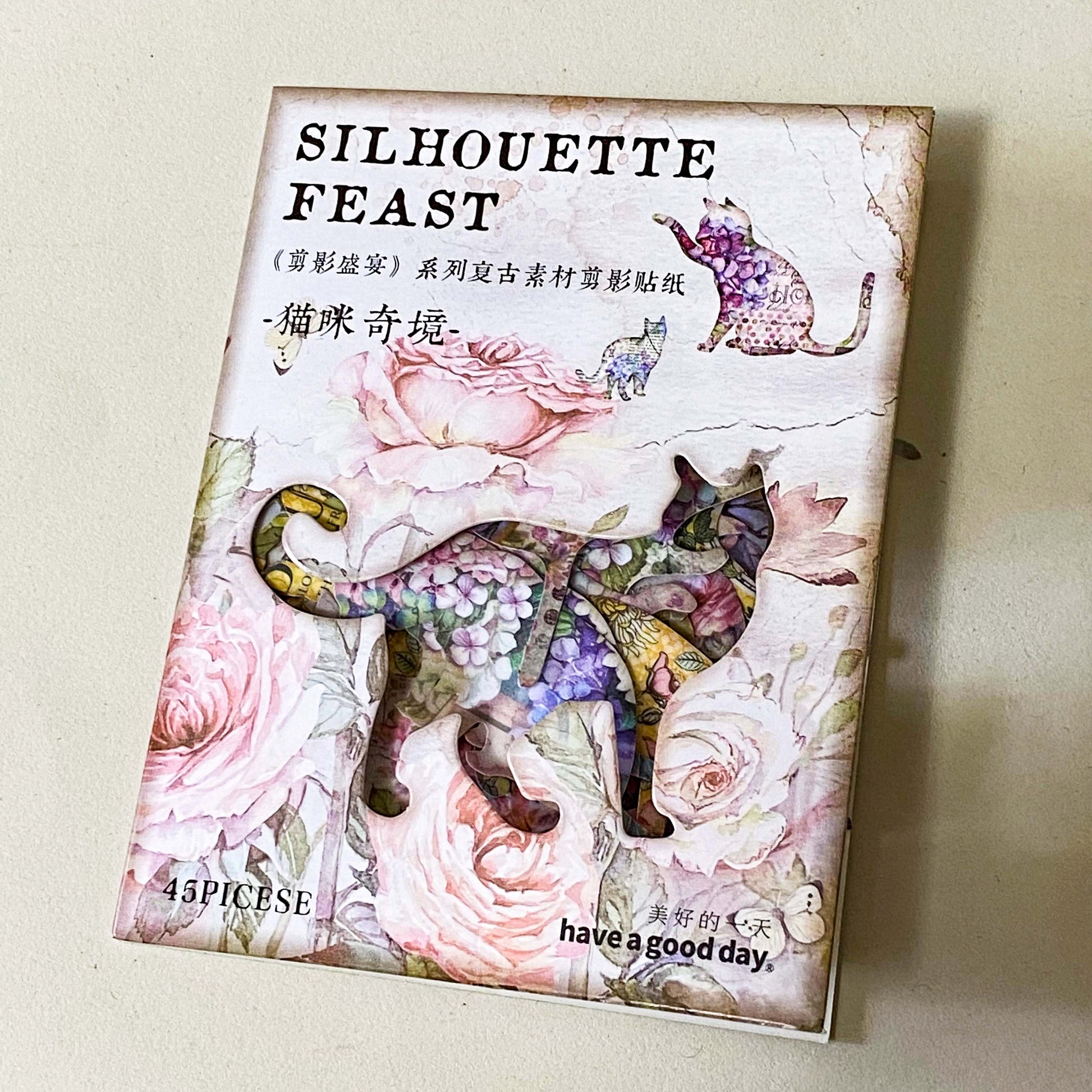 pack of 45 paper stickers featuring elegant cat silhouettes filled with vintage roes, hydrangeas, botanical flowers and antique inspired illustrations. uk stationery shop for journaling and scrapbooking.