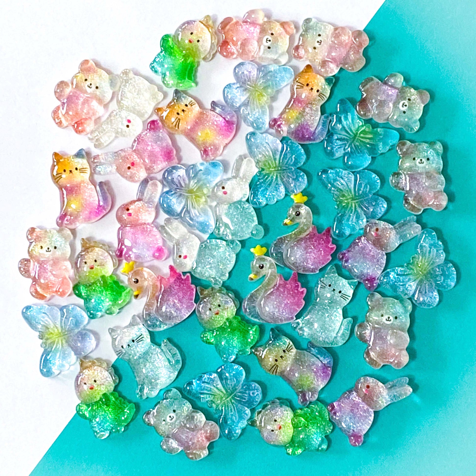 Cute kawaii glitter resin resins fb fbs flatbacks flat back Uk craft supplies shop store bunny rabbit rabbits rainbow glittery chunky cat cats kitty bow bows blue butterfly butterflies Swan Dino dinosaur dinosaurs 