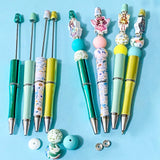 fairy topper beaded pen making kit with silicone round beads and pen base, sparkly rondelle spacers and wooden fairy topper