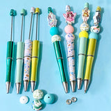 fairy topper beaded pen making kit with silicone round beads and pen base, sparkly rondelle spacers and wooden fairy topper