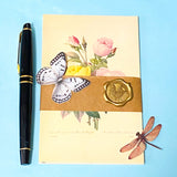 vintage botanical Kew Gardens postcard bundle wrapped in kraft belly band with wax seal sticker with insect die cuts and floral stickers ephemera