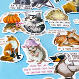 set of 50 animal positive quote stickers with affirmations featuring illustrated wildlife including cats, foxes, hedgehogs and ducks on a soft blue background