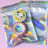 holo holographic silver pale pink laser rainbow self seal resealable bag bags plastic cello stiff poly polythene uk cute kawaii stationery packaging supplies shop store pretty 