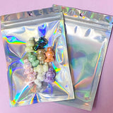holo holographic silver pale pink laser rainbow self seal resealable bag bags plastic cello stiff poly polythene uk cute kawaii stationery packaging supplies shop store pretty 