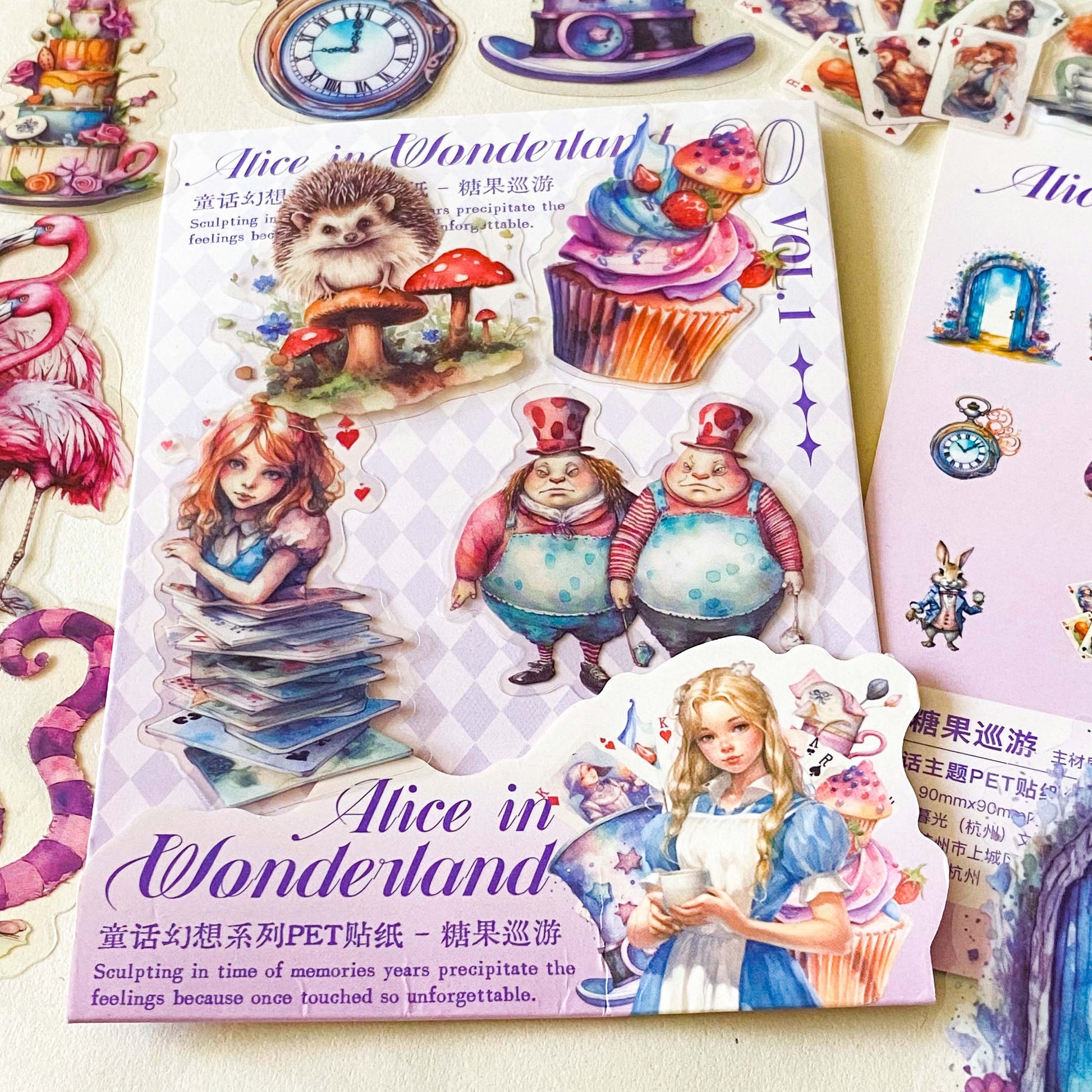 alice in wonderland dream garden clear PET stickers set with 30 large pastel stickers including Alice, White rabbit, Cheshire Cat, Tweedle Dum and Tweedle Dee, teacups and mushrooms.