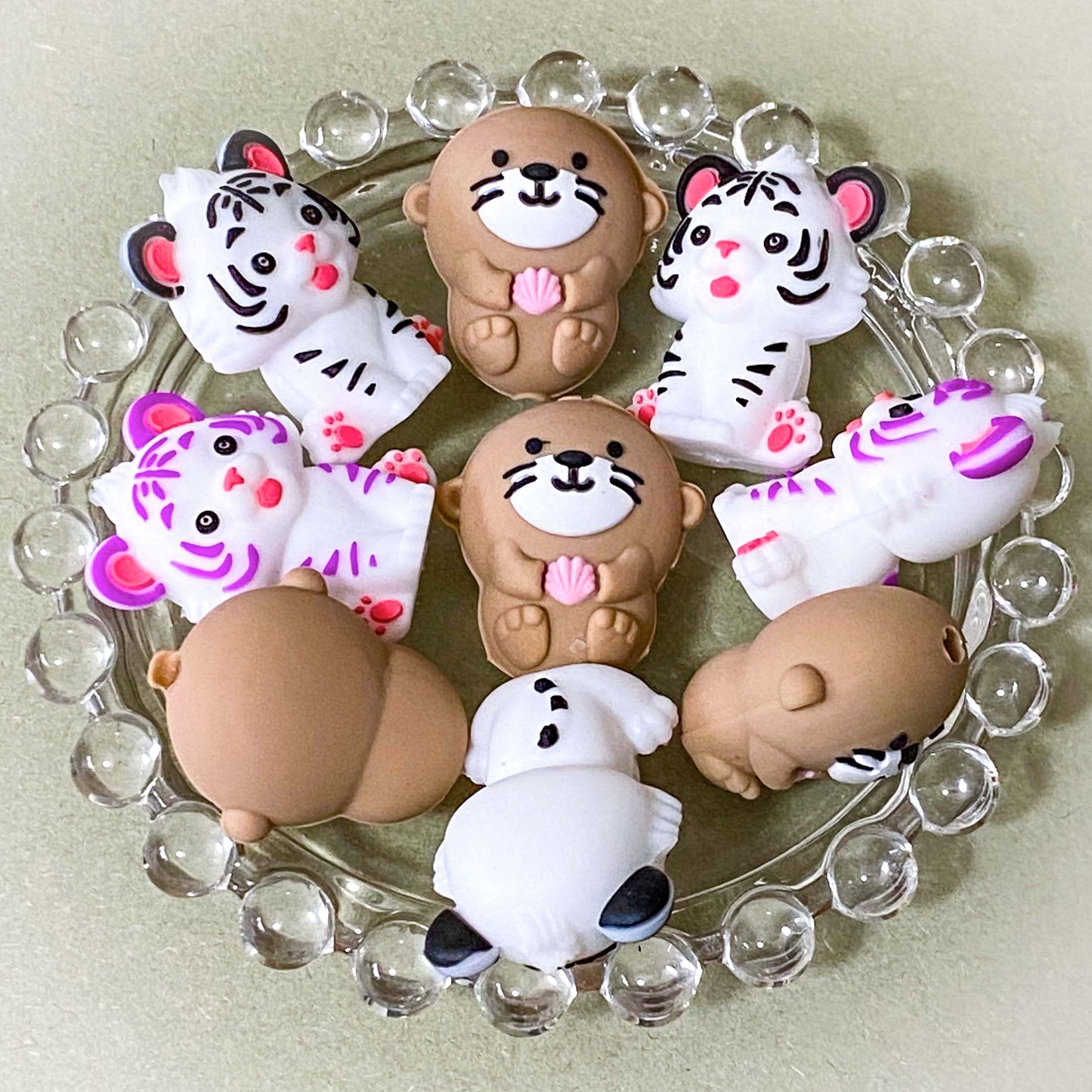 white tiger or brown otter larger silicone beads 26mm 30mm big focal bead. otters and tigers. for beaded pens and jewellery making. uk craft shop.