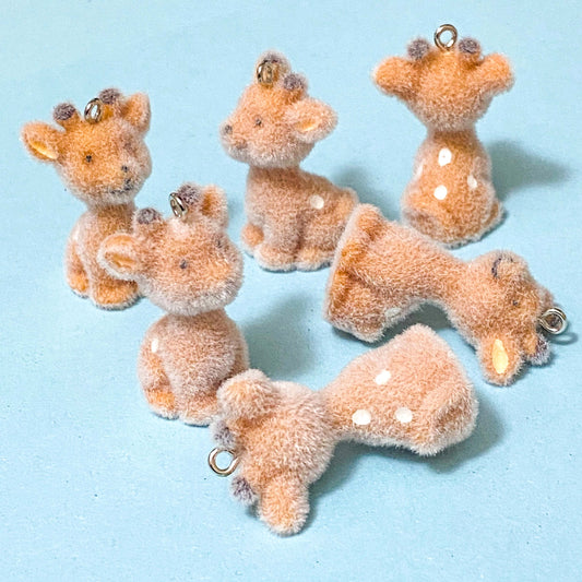 silver tone baby deer brown flocked resin charms on a blue background