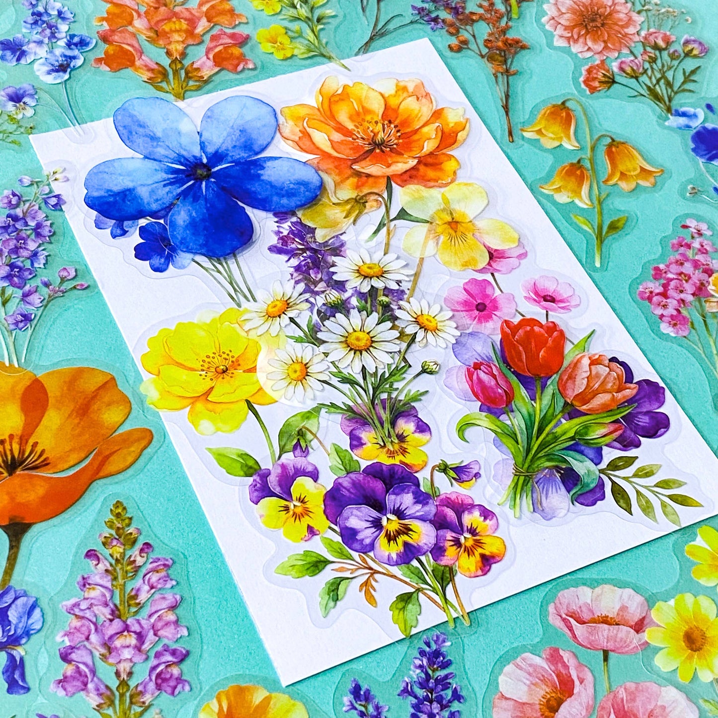 pack of 50 large PET transparent stickers of botanical flowers featuring garden plants in a range of bright colours with daisy, pansy, tulip, foxglove, hydrangea, poppy, lupin. uk stationery shop.