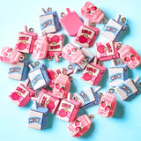 milk carton and straw resin cute kawaii uk charm charms strawberry pink blue bottle food and drink uk craft supplies jewellery making pendant
