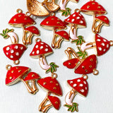 red and white spotted spots mushroom mushrooms charm charms enamel enamelled gold tone pendant green grass pair of cute kawaii craft supplies uk woodland toadstool fungi metal 