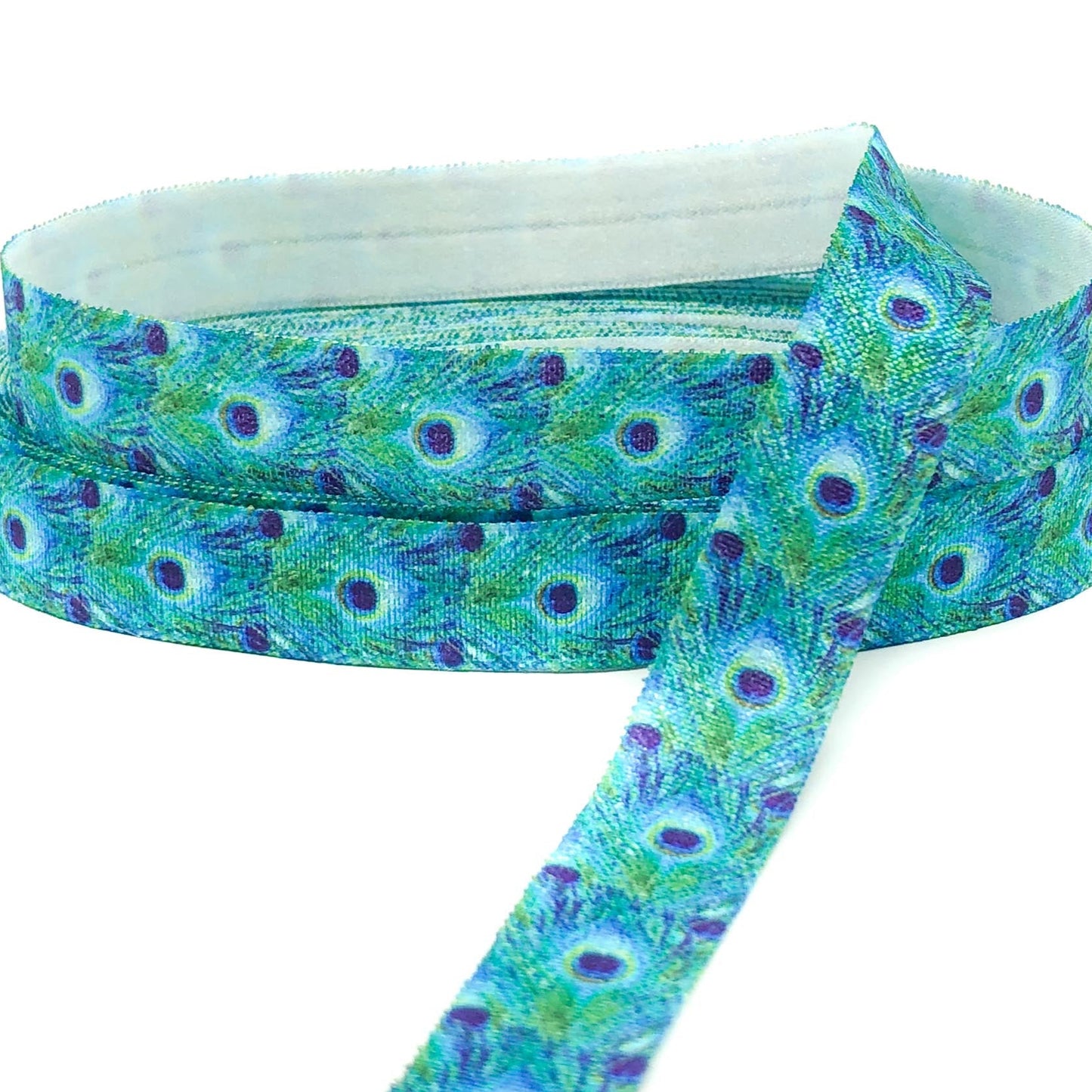 peacock feather water colour watercolour pretty cute elastic ribbon fold over elastics ribbons uk craft supplies stretch peacocks blue green turquoise teal feaathers foe yard